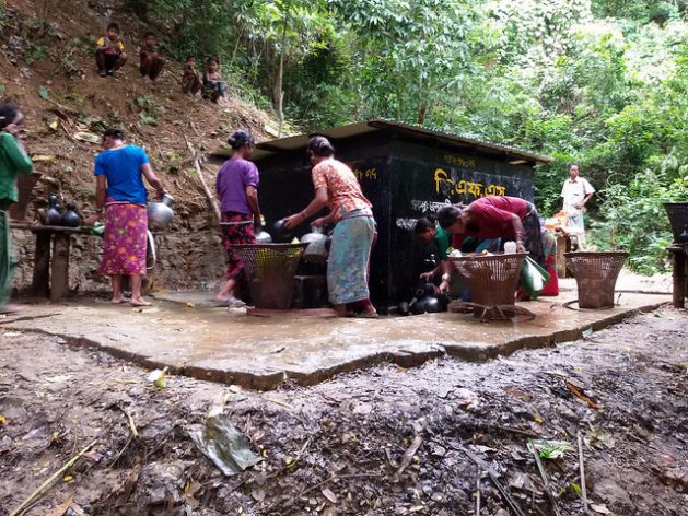 Ethnic women collect drinking water from a water plant in Chittagong Hill Tracts, Bangladesh. Credit: Rafiqul Islam/IPS