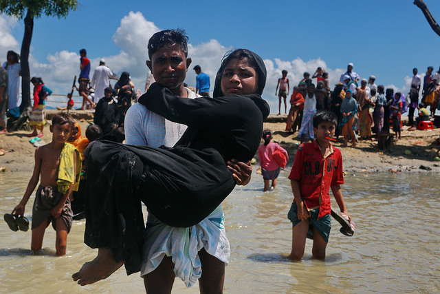 Newly arrived Rohingya refugees enter Teknaf from Shah Parir Dwip after being ferried from Myanmar across the Naf River. Credit: Farid Ahmed/ IPS