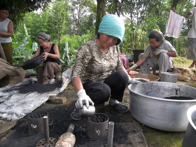 Instead of cutting forests to make charcoal for household energy, these Chinese women use bamboo which will grow back. Photo Courtesy of INBAR