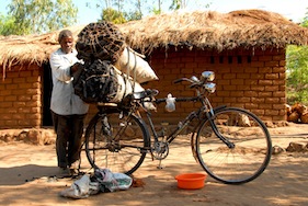 Charcoal production in Malawi is done inefficiently using traditional methods and tools that lead to large areas of land being felled. / Credit:Travis Lupick/IPS 