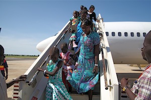 South Sudanese returnees arrive in Juba on one of the first flights of an airlift that will return 12,000 nationals. / Credit:Jared Ferrie/IPS