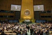 A wide view of the opening of the MDG Summit, as Secretary-General Ban Ki-moon (on screens) delivers remarks.  / Credit:UN Photo/Rick Bajornas
