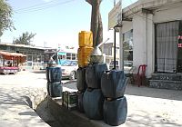 Jerry cans of fuel are available everywhere in Kabul.
  / Credit:Anand Gopal/IPS