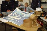 Producing designer clothing. / Credit:La Juanita