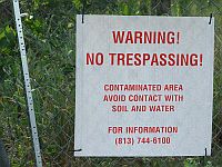 A warning sign in the town of Tallevast, Florida. / Credit:Heather R.