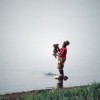 Young mother and child on the bank of the Niger River at Bamako, the capital of Mali. Credit: UN Photo/John Isaac