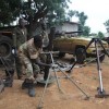 SPLM-N soldiers clean weapons they say they took from government forces.  Credit: Jared Ferrie/IPS