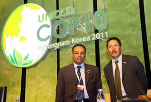 Bashir Nwer of Libya and Chencho Norbu, Bhutan, at the United Nations Conference to Combat Desertification in Changwon, South Korea. Credit: Franx Dejon/IISD Reporting Services Bashir Nwer of Libya and Chencho Norbu, Bhutan, at the United Nations Conference to Combat Desertification in Changwon, South Korea. Credit: Franx Dejon/IISD Reporting Services