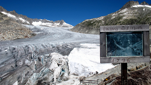 The signpost in Switzerland warns of glacier retreat. Credit: Ray Smith/IPS