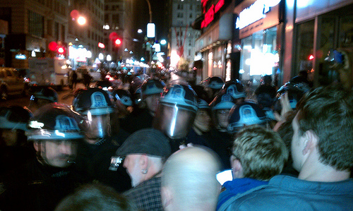 Protestors face off with riot police early Tuesday morning. Credit: Nick Gulotta/CC BY 2.0