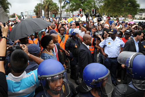 Protesters rallied in Durban and cities around the U.S. demanding that the "world's biggest polluter" start supporting climate solutions. Credit: UNclimatechange/CC By 2.0
