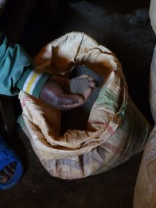 A sack of cassiterite (tin ore) at a trader's house in Nyabibwe, DRC. Credit: Courtesy of Global Witness