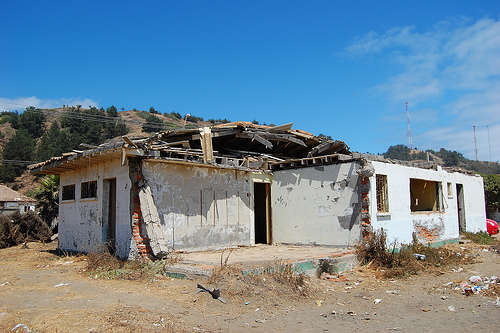 Two years later, this house in the coastal town of Iloca still bears witness to the devastating force of the tsunami.  Credit: Marianela Jarroud/IPS
