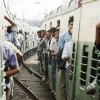 A view of passengers aboard trains connecting the suburbs of Kolkata, India. Credit: UN Photo/Kibae Park