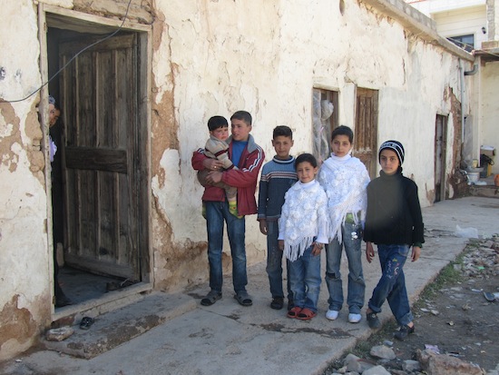 A Syrian refugee family in the Lebanese border village of Ersal Credit:  Mona Alami/IPS