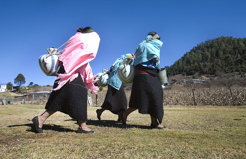Women, like these indigenous women hauling water in Chiapas, Mexico, are often responsible for securing water for their families. Credit: Mauricio Ramos/IPS