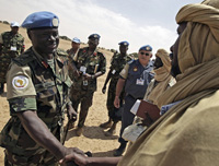 General Martin Luther Agwai, shakes hands with the Commander of the Sudan Liberation Army (SLA) Unity faction in El Hosh, Sudan. Credit: UN Photo/Albany Associates General Martin Luther Agwai, shakes hands with the Commander of the Sudan Liberation Army (SLA) Unity faction in El Hosh, Sudan. Credit: UN Photo/Albany Associates