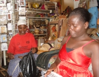 Improving lives: Artisans Rose Sanyu (left) and Milly Kinene. Credit:  Wambi Michael/IPS