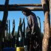Poor rural water users like Sipoya Ntumbankuru pay a disproportionate share of the cost. Credit:  Servaas van den Bosch/IPS