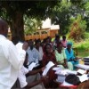 Village health team focal person Robert Kito giving guidelines to his team members at Gombe hospital compound. Credit:  Joshua Kyalimpa/IPS