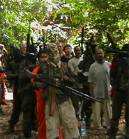 Niger Delta militants with hostages in 2006: a campaign of kidnapping and attacks on oil installation has crippled Nigeria's oil exports. Credit:  Gretchen Wilson/IRIN