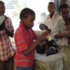 Children like Maye (in red) are sometimes suspected of spying or planting planting roadside bombs -- and executed. Credit:  Abdurrahman Warsameh/IPS