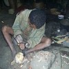 This teenage boy spends his days cutting stones in a quarry. Credit:  Fanja Saholiarisoa/IPS
