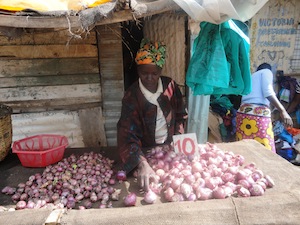 Everlyne Wanjiku, a single mother of five, has earned a living selling vegetables in the sprawling Kibera slum in Nairobi, Kenya, for 30 years. Credit: Brian Ngugi/IPS