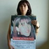 Susana Trimarco holding a missing persons poster for her daughter, Marita Verón. Credit: Courtesy of Metrodelito. 