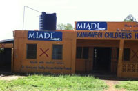 An orphanage in Kenya marked for demolition to make way for a road project funded by the World Bank. Credit: Richard Portsmouth/CC by 2.0