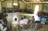 Haitians concerned about the impacts of unchecked mining meet at a sweltering tin-roofed church near Grand Bois on Jul. 5, 2013. Source: HGW/Lafontaine Orvild