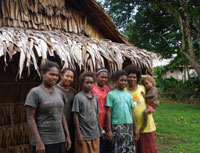 Maddlyn Maelofa (far right) and young girls in Huahai village in Malaita Province in the Solomon Islands. Credit: Catherine Wilson/IPS.
