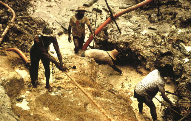 Illegal gold miners damage the territory and attack the families of the Yanomami. Credit: Courtesy Colin Jones/Survival International