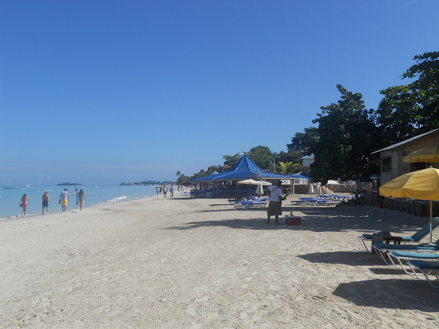 Taken Apr. 19, 2014, this photo shows a fully restored beach at Negril. The sand is taken away by storms and returns a few months later. Hoteliers fear that the breakwater will prevent the natural generation from occuring. Credit: Mary Veira/IPS