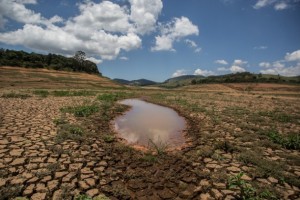 A puddle is all that is left in one of the reservoirs of the Cantareira System, which normally supplies nearly half of the São Paulo metropolitan region. Courtesy of Ninja/ContaDagua.org