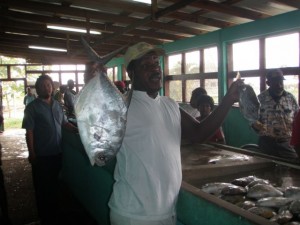Vendors at the fish market in Belize. Courtesy of the Fisheries Department Belize City, Belize.