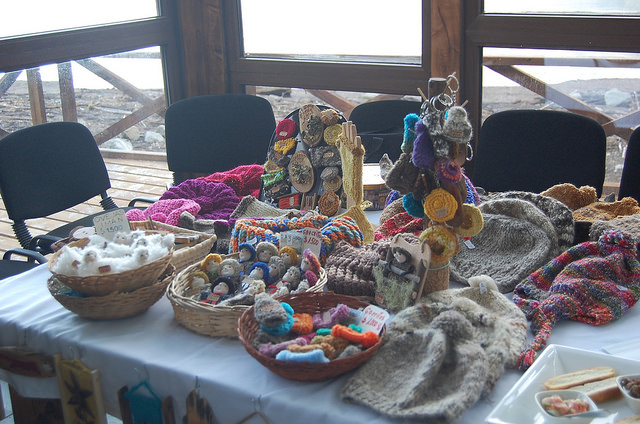 The craftswomen who belong to the Association of Peasant Women of Patagonia in southern Chile are eagerly awaiting the opening of their own community centre, where they will exhibit and sell their products. Meanwhile they sell them in public fairs and the locales of other women’s organisations in the Aysén region. Credit: Marianela Jarroud/IPS