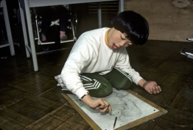 A disabled but talented young artist at the Kome School in Tokyo. Credit: UN Photo/Jan Corash