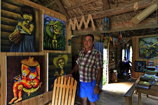 Self-taught artist Miguel Antonio Remedios in his rural home, which he has turned into a gallery, art studio and museum of a traditional western Cuban house in El Abra, a mountain village in the western province of Pinar del Río. Credit: Jorge Luis Baños/IPS