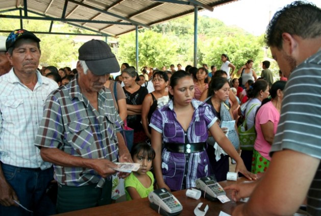 Beneficiaries of one of the subsidies for farmers receive the ...