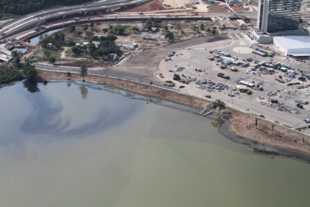Raw sewage stains in Jacarepaguá lagoon alongside the Olympic Park, where the Olympic Games are to be held August 5-21 in the Brazilian city of Rio de Janeiro. Foul mud was to be dredged from the lagoon but this was not carried out because of funding cuts. Credit: Courtesy of Mario Moscatelli
