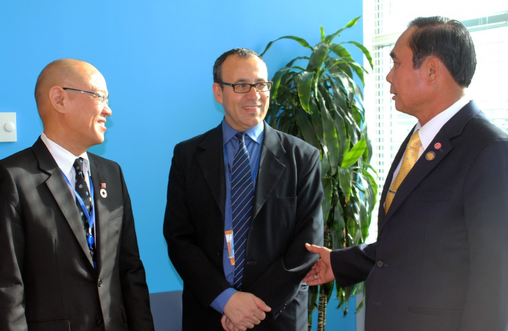 Prime Minister Chan-o-cha (right) speaks with Ambassador Virachai Plasai, Permanent Representative of the Kingdom of Thailand to the UN (left) and Mourad Ahmia, Executive Secretary of the Group of 77 (centre). Credit: Tharanga Yakupitiyage / IPS.