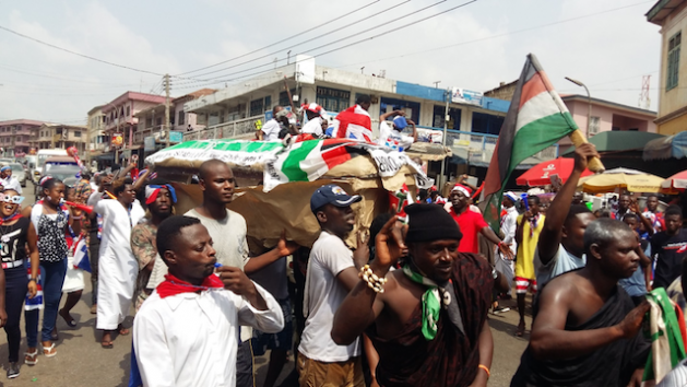 Residents in Kumasi, the capital of Ghana's Ashanti region and stronghold of the opposition NPP, carry a casket, ready to bury John Mahama and his NDC whom they say is politically dead. Credit: Kwaku Botwe/IPS