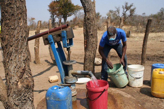 Curbing illicit financial flows will free finances for development projects like the provision of safe drinking water. A man collecting water at a government-funded borehole in Southern Zimbabwe. Credit: Busani Bafana/IPS