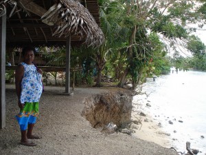 Higher tides and coastal erosion are encroaching on homes and community buildings in Siar village, Madang Province, Papua New Guinea. Credit: Catherine Wilson/IPS