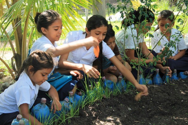 World Food Day - Students at a school in an indigenous village in western Honduras work in the school garden, where they learn about nutrition and healthy eating. Since 2016 Honduras has a law regulating a new generation oschool meals programme, which focuses on a healthy diet and serves fresh food from local family farmers and school gardens. Credit: Thelma Mejía/IPS