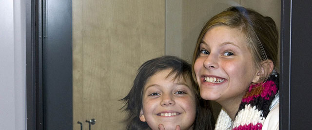 Two happy students from the Kulturama School of Performing Arts in Stockholm pose for a picture during Secretary-General Ban Ki-moon's visit to their school. UN Photo/Eskinder Debebe