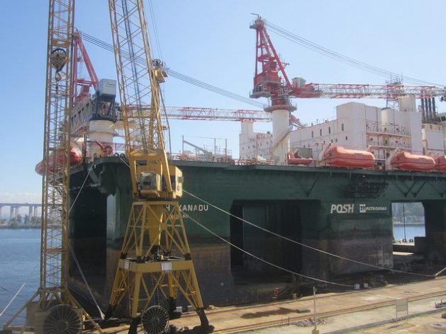 An Atlantic Ocean deepwater oil platform moored at the Astillero Maua (Maua Shipyard) in Niteroi, in southeast Brazil, after being repaired, while awaiting being hired out to resume its activities. Credit: Mario Osava/IPS
