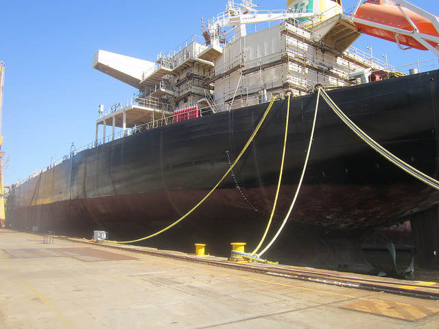 The Zelia Gatai, one of the three unfinished tankers in the Maua Shipyard in southeast Brazil, waiting for renewal of the contract suspended two years ago in order to complete the remaining 10 percent of its construction. This Panamax ship has a length of 228 metres. Credit: Mario Osava/IPS