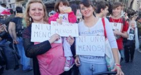 Three generations of women from an Argentine family hold posters with the slogan "Ni Una Menos", which means "Not one [woman] less", in one of the demonstrations against femicides in Buenos Aires. Credit: Fabiana Frayssinet / IPS